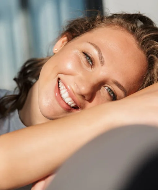 Young adult woman smiling with straight teeth